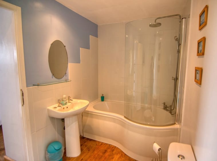 Modern bathroom with bathtub and shower