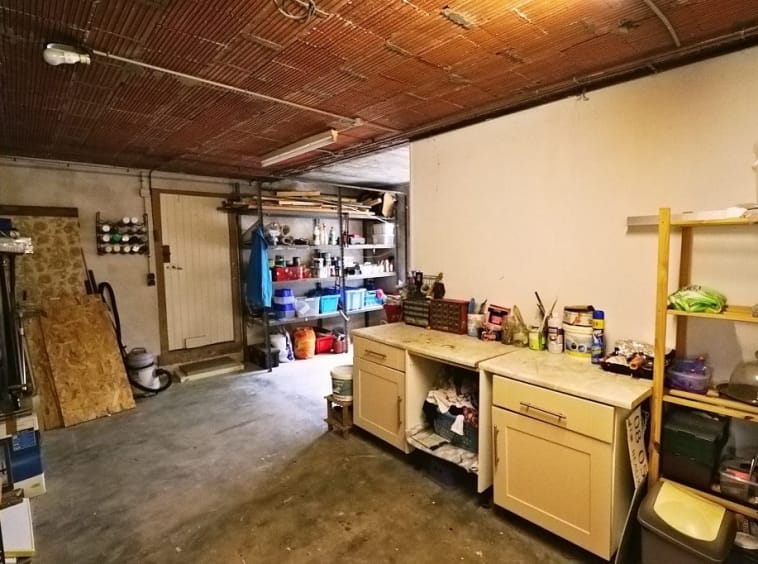 Garage with shelves and tools